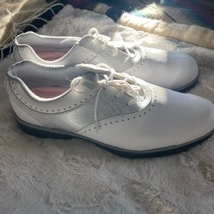 Emerge brand women’s golf shoes. White leather lace up